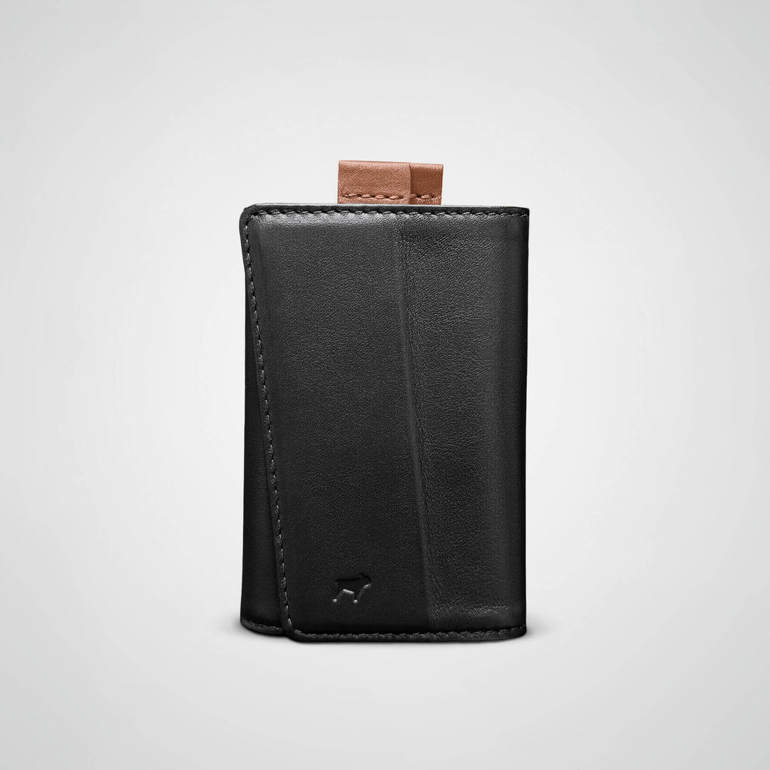 Black leather wallet with a brand logo on a light gray background