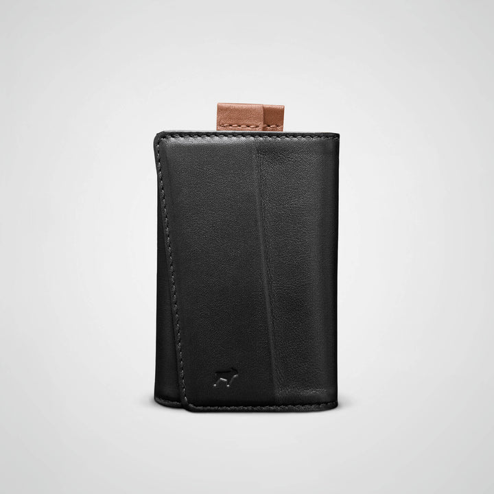 Black leather wallet with a brand logo on a light gray background