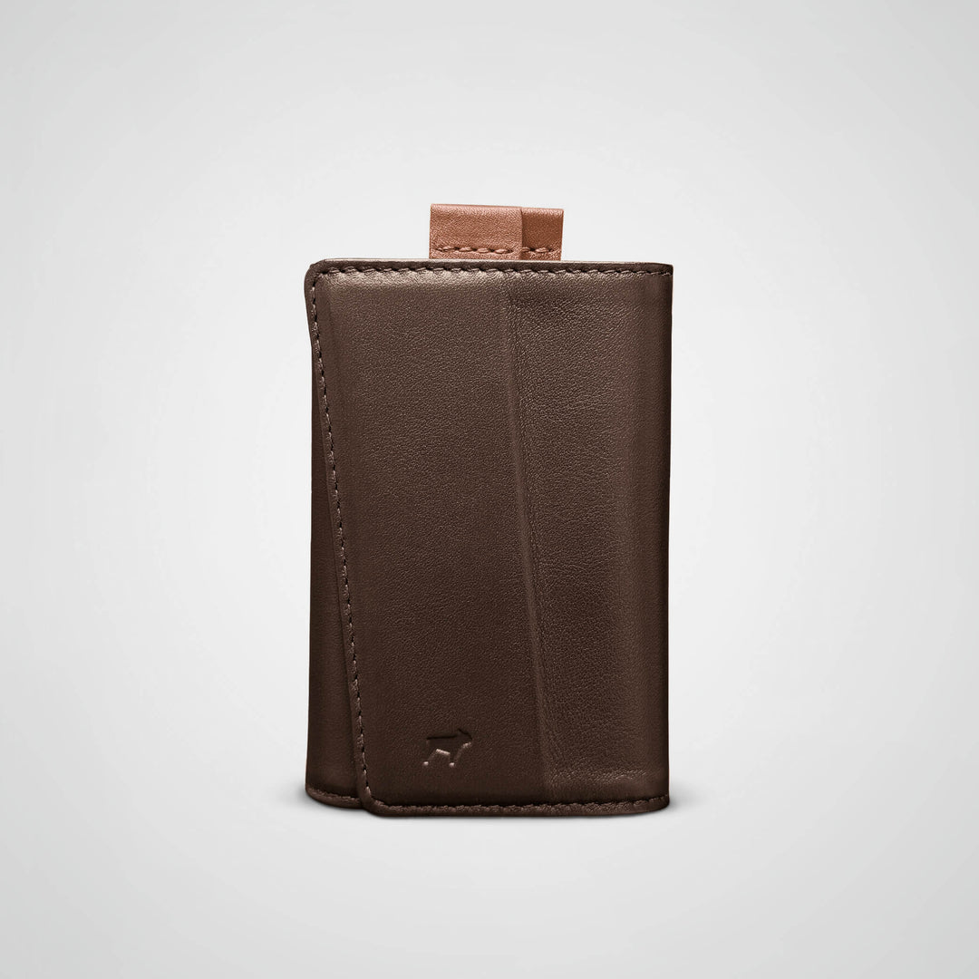 Brown leather wallet on a light gray background
