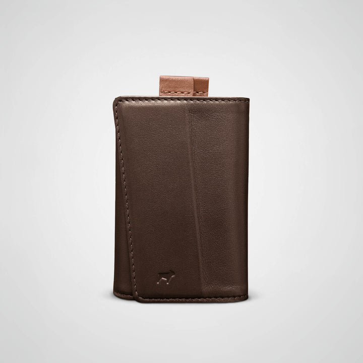 Brown leather wallet on a light gray background