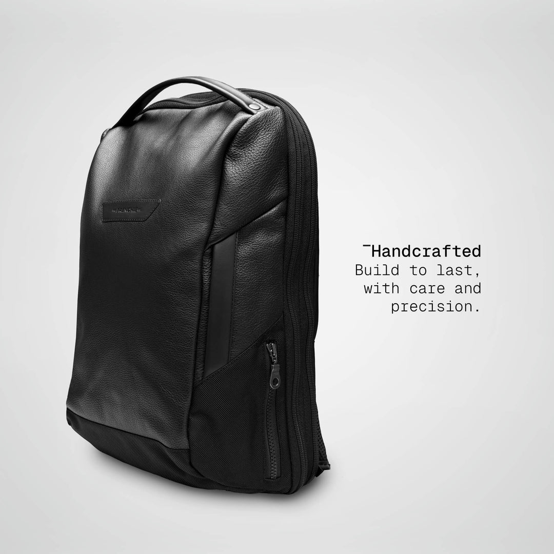 Black Vector Speed Backpack in leather, angled view