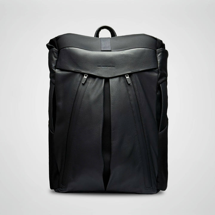 Black backpack on a light gray background