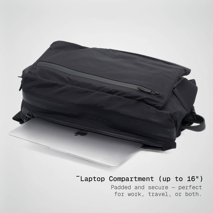 Black backpack with a laptop compartment on a white background