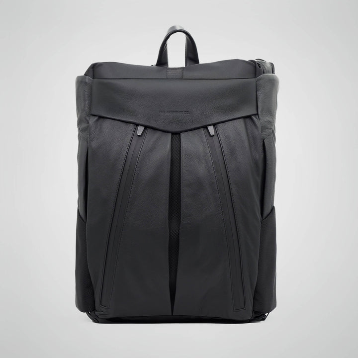 Black backpack on a light gray background