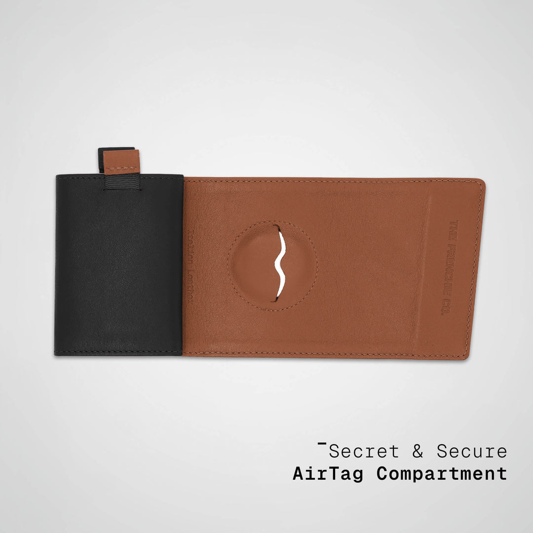 Black and brown leather case with a secret compartment for AirTag on a light gray background