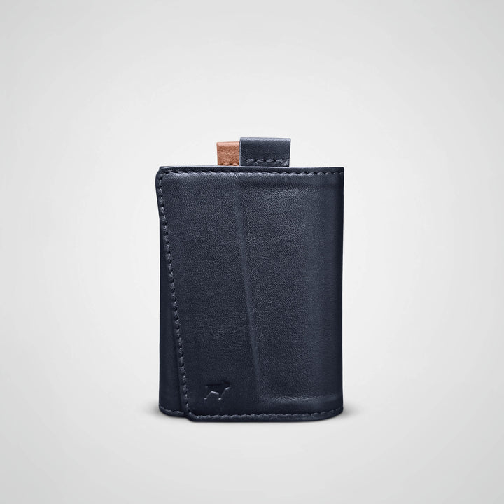Black leather wallet on a light gray background