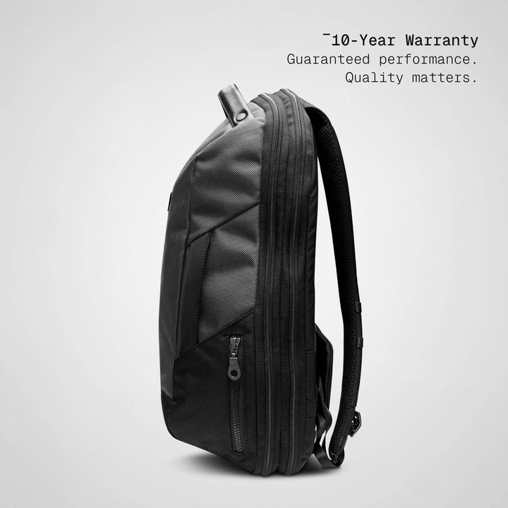 Grey Vector Speed Backpack, side profile showing the 16 cm depth