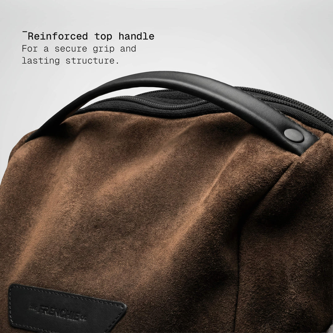 Top handle detail on the brown Vector Speed Backpack