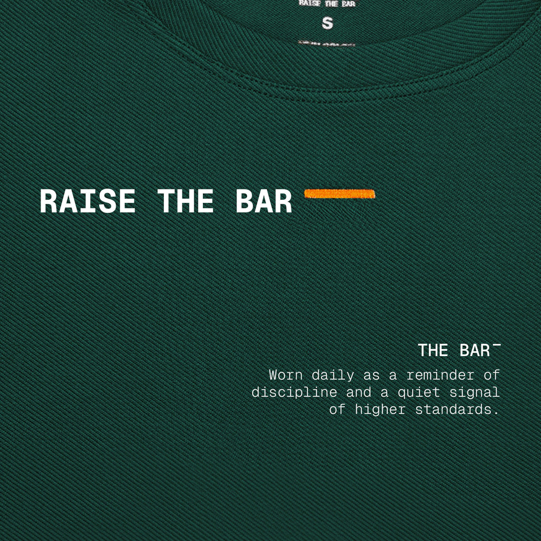 RAISE THE BAR — Camiseta Manga Corta