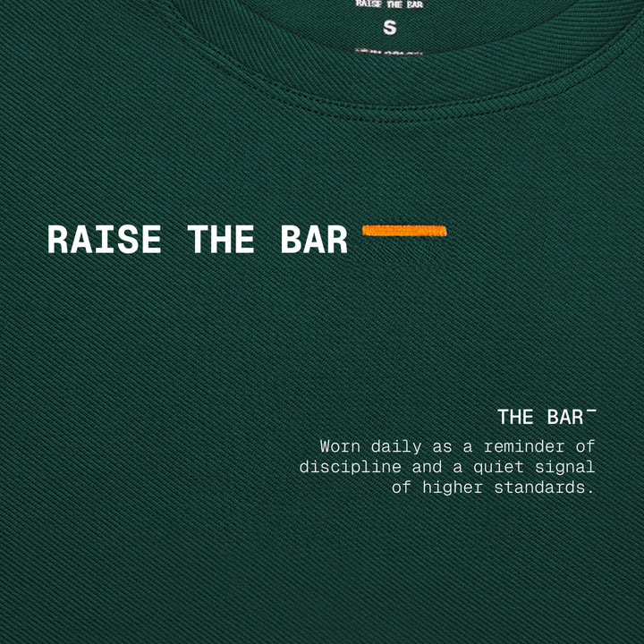 RAISE THE BAR — Camiseta Manga Corta
